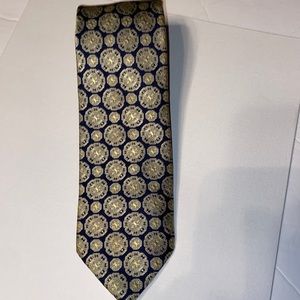 Zylos neck tie navy blue with gold medallion design.